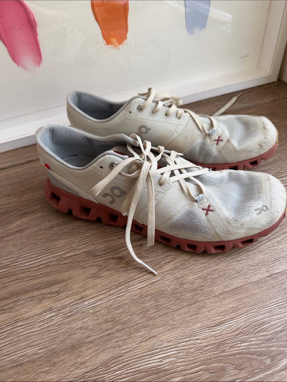 On Running Off-White Sneakers with Coral Outsoles